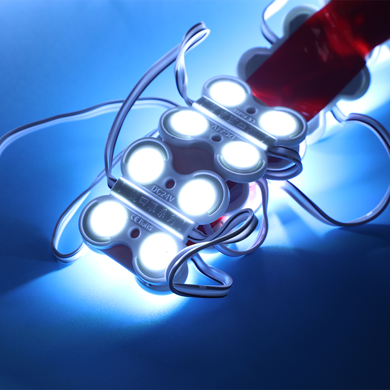 Four-lamp injection molding module for white light